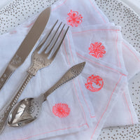 FOUR LINEN NAPKINS