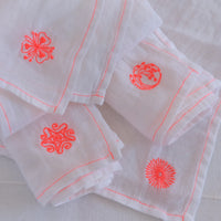 FOUR LINEN NAPKINS
