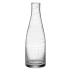 carafe en verre incrusté de petites bulles sur fond blanc - tsé tsé