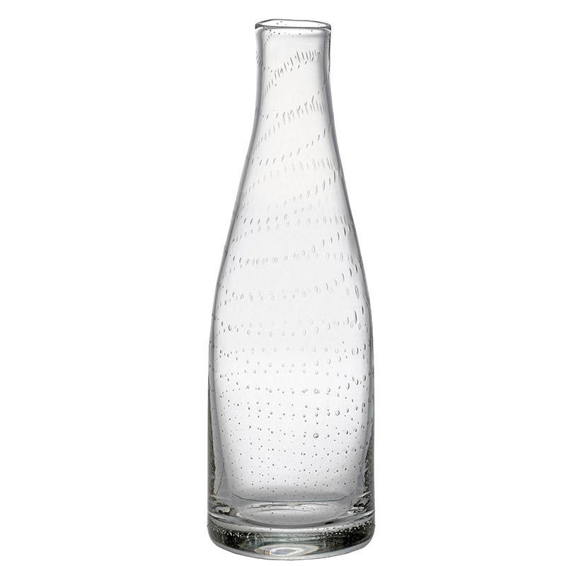 carafe en verre incrusté de petites bulles sur fond blanc - tsé tsé