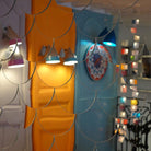 reflet de lampes colorées dans un miroir effet écailles - tsé tsé