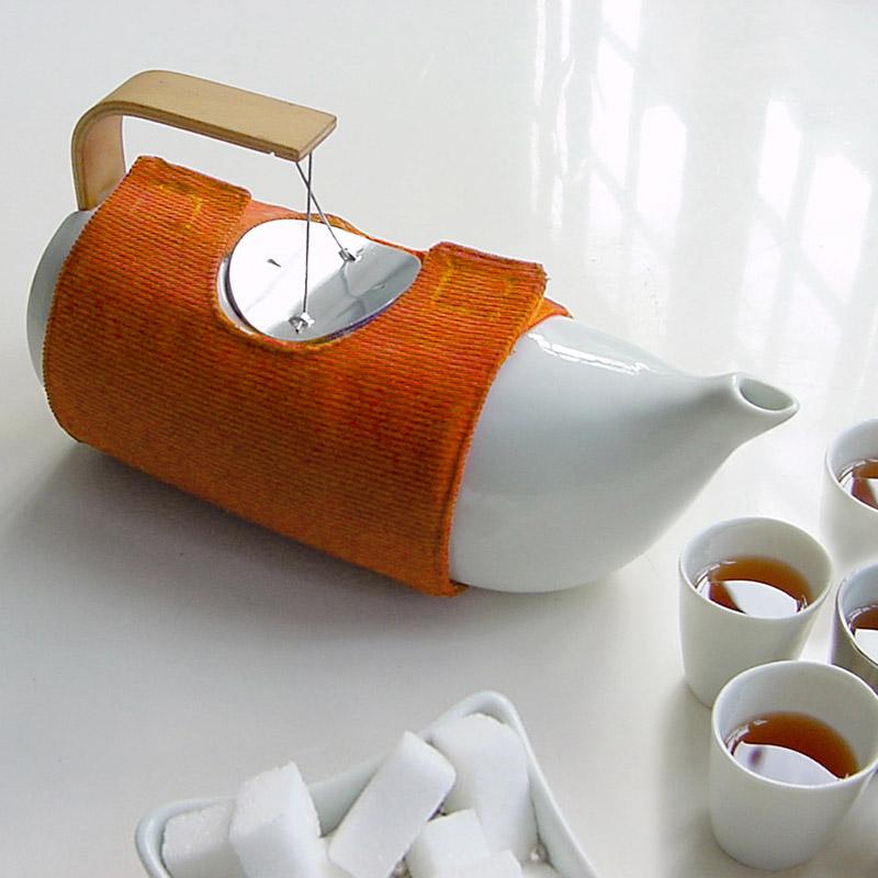 housse orange pour maintenir le thé au chaud dans la théière mirza - tsé tsé
